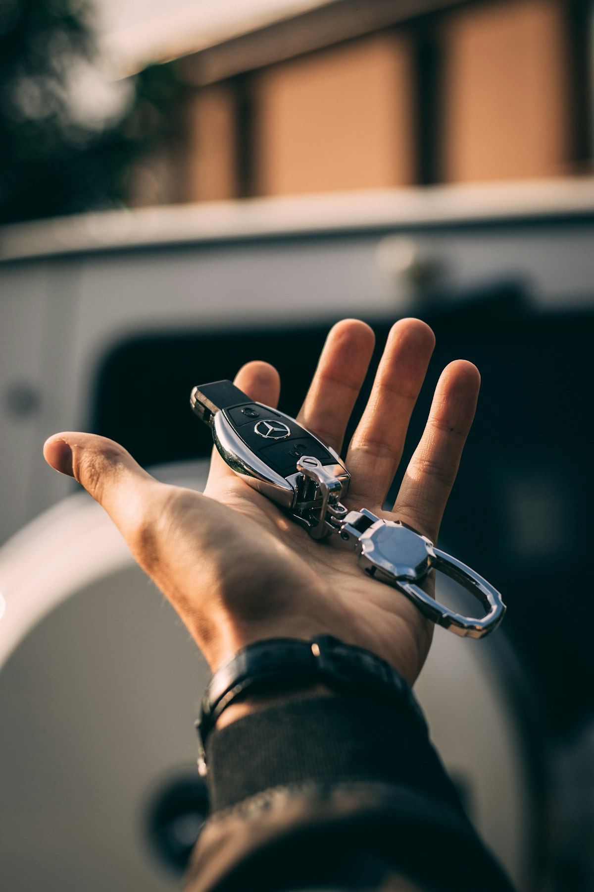 Car key fob in hand